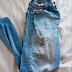 Distressed Blue Jeans